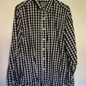 It’s large size,100%cotton,black and white color shirt.